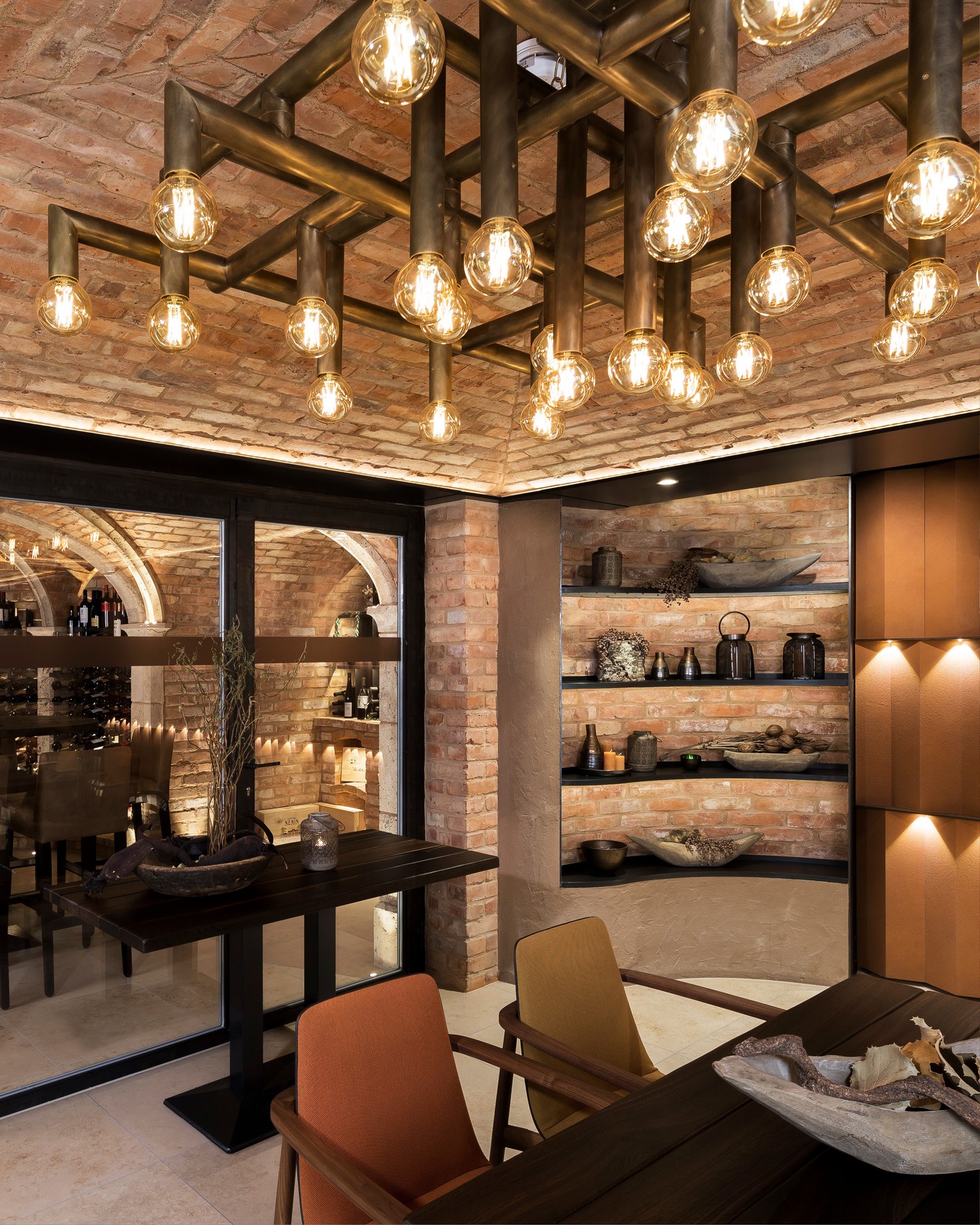 A space shaped by history and defined by detail.
The historic brick vaults set the tone for an intimate wine cellar where architecture remains the focal point. Carefully composed lighting enhances the depth and texture of the masonry, while custom-crafted furniture is designed to echo the room's unique form. The result is a harmonious balance of authenticity, craftsmanship, and understated luxury.
Designed in 2017, it remains timelessly elegant.
Neues Tor Bad Wimpfen, DE
#kitzigdesignstudios #kitziginteriordesign #interiordesign #winetime #winecellar #winery #restaurantdesign #wineexperinece