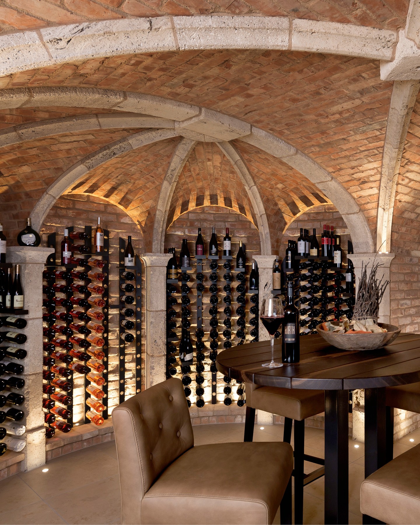 A space shaped by history and defined by detail.
The historic brick vaults set the tone for an intimate wine cellar where architecture remains the focal point. Carefully composed lighting enhances the depth and texture of the masonry, while custom-crafted furniture is designed to echo the room's unique form. The result is a harmonious balance of authenticity, craftsmanship, and understated luxury.
Designed in 2017, it remains timelessly elegant.
Neues Tor Bad Wimpfen, DE
#kitzigdesignstudios #kitziginteriordesign #interiordesign #winetime #winecellar #winery #restaurantdesign #wineexperinece